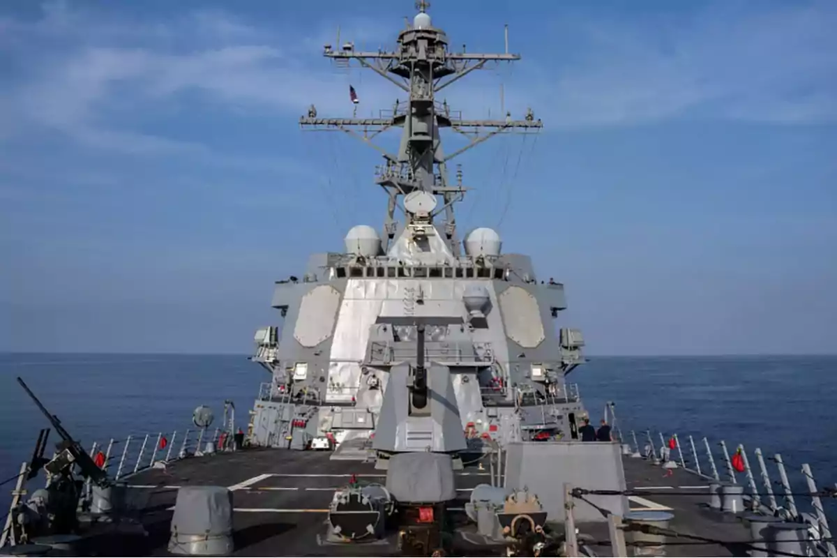 Warship sailing on the sea under a clear sky