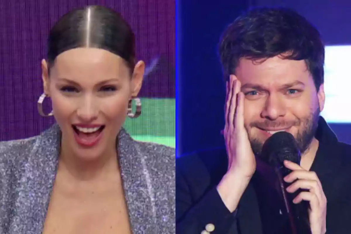 Una mujer sonriente con el cabello recogido y un hombre con barba sosteniendo un micrófono y la mano en la cara, ambos en un set de televisión Una mujer sonriente con el cabello recogido y un hombre con barba sosteniendo un micrófono y la mano en la cara, ambos en un set de televisión