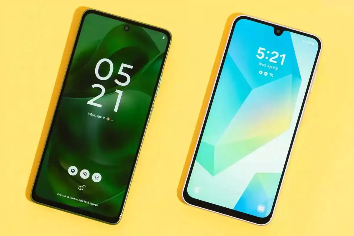 Two smartphones on a yellow surface, one with a green screen and the other with a blue screen, both displaying the time 5:21. Two smartphones on a yellow surface, one with a green screen and the other with a blue screen, both displaying the time 5:21.