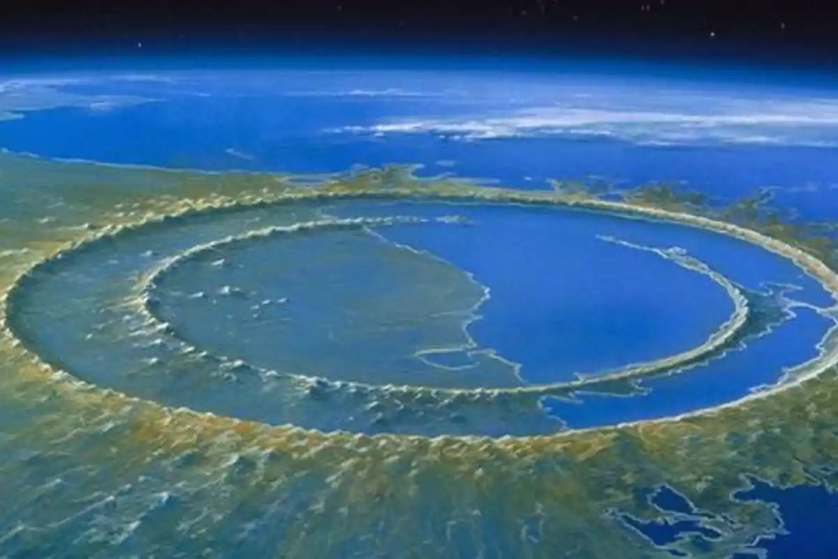 Vista aérea de un gran cráter circular en la superficie terrestre rodeado de agua y vegetación