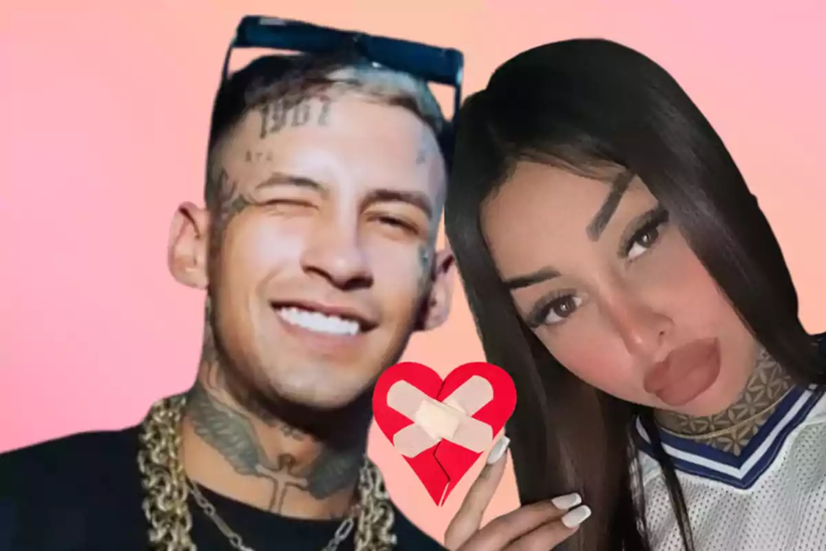 A man and a woman pose together in front of a pink background while she holds a broken heart with band-aids.