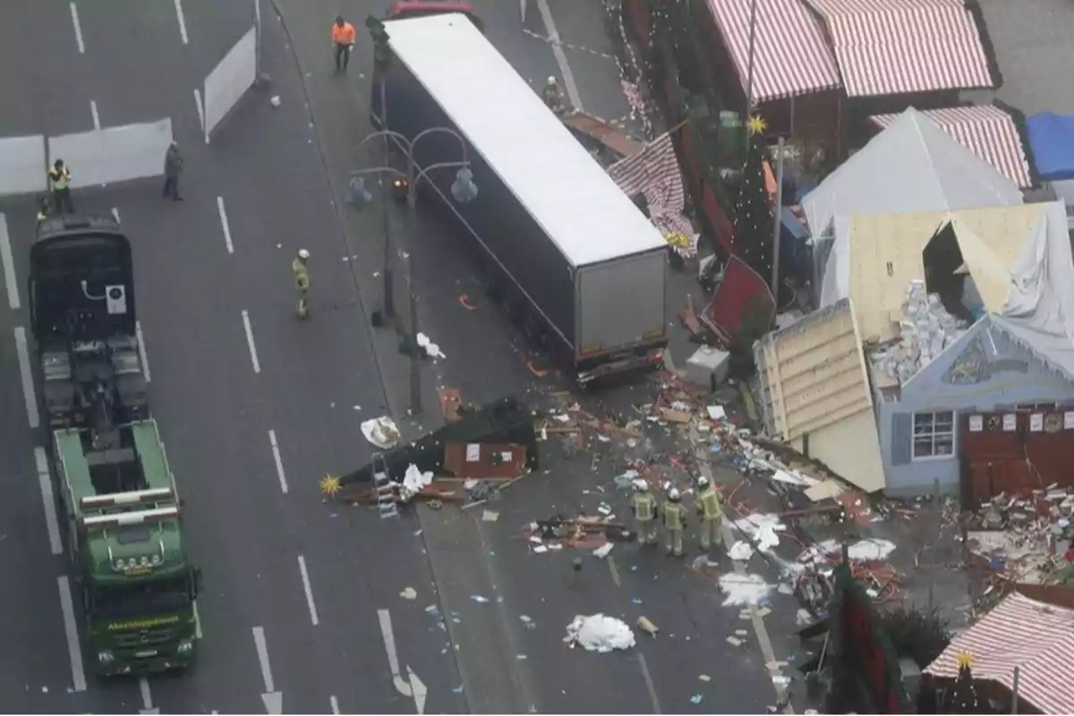 A truck has crashed into several stalls at a Christmas market, leaving debris and damage as emergency crews work at the scene. A truck has crashed into several stalls at a Christmas market, leaving debris and damage as emergency crews work at the scene.