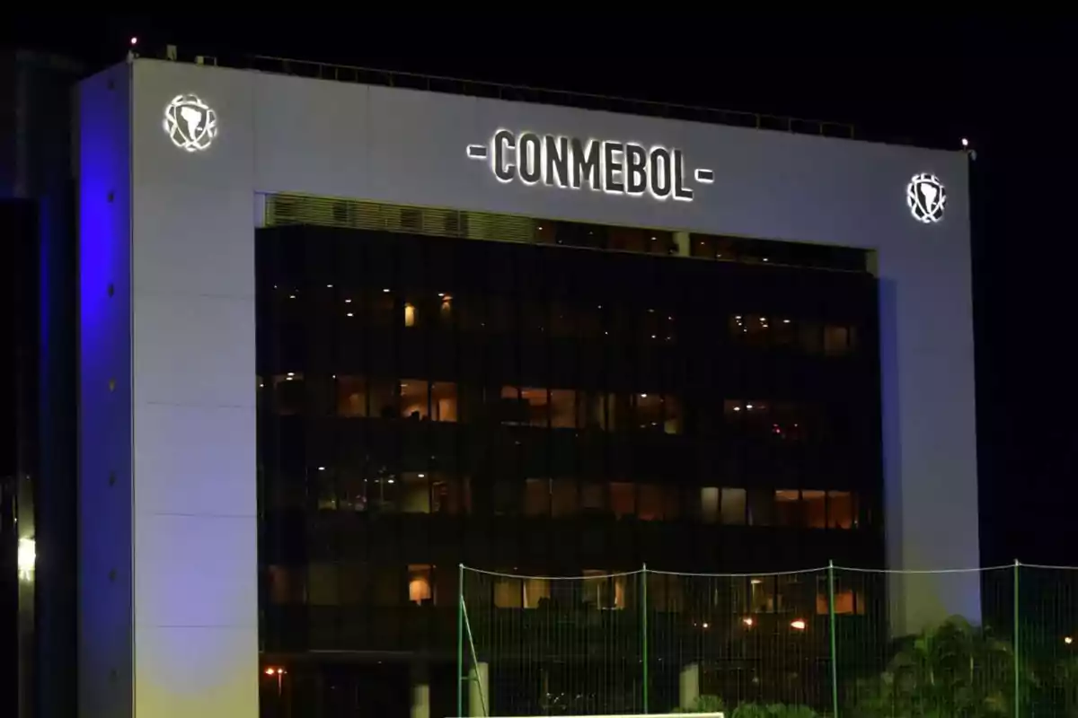 CONMEBOL building lit up at night