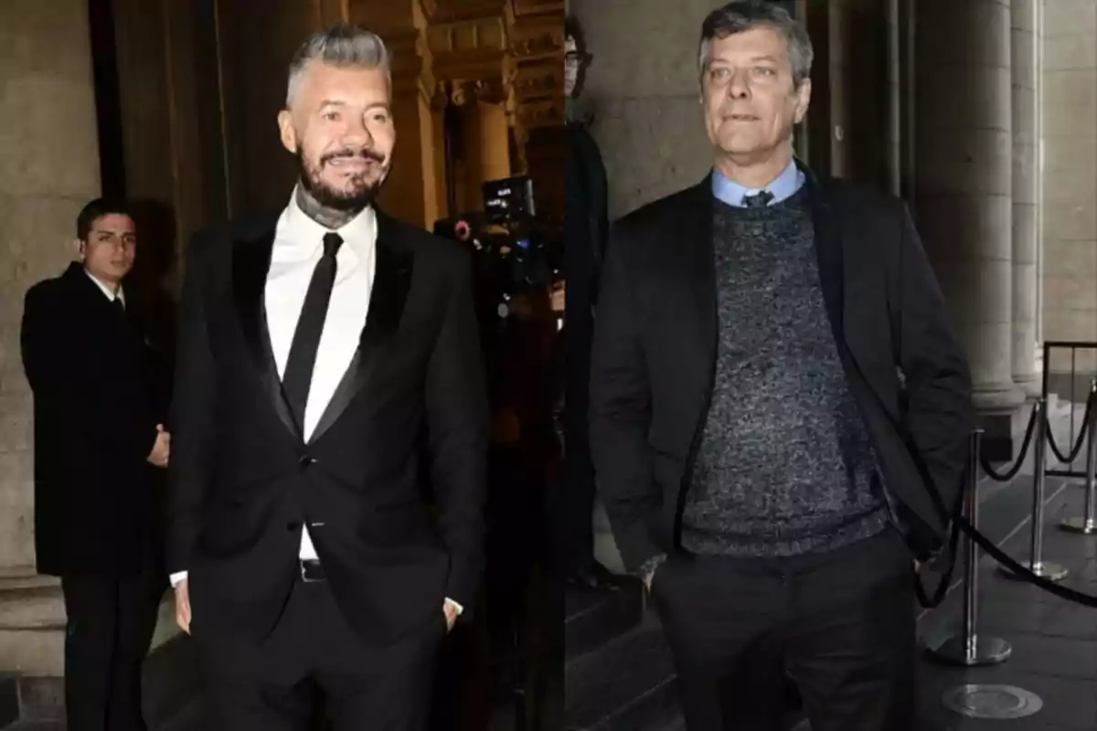 Dos hombres vestidos de manera elegante posan en un evento nocturno frente a un edificio con columnas. Dos hombres vestidos de manera elegante posan en un evento nocturno frente a un edificio con columnas.