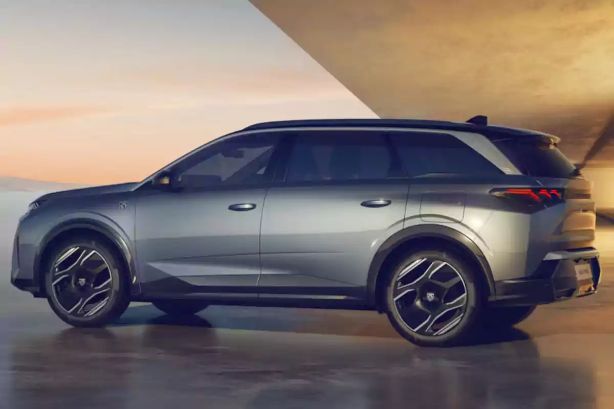 Modern gray SUV parked in an urban setting with warm sunset light Modern gray SUV parked in an urban setting with warm sunset light