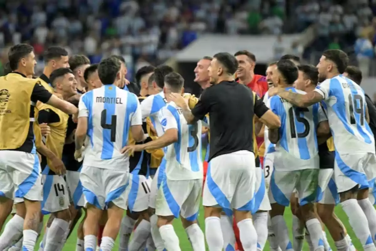Players of the Argentine national soccer team celebrate together on the field after an important match. Players of the Argentine national soccer team celebrate together on the field after an important match.