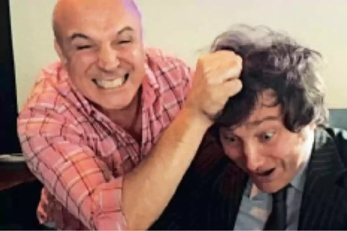 Smiling bald man tightly grabs the hair of another man who looks surprised. Smiling bald man tightly grabs the hair of another man who looks surprised.