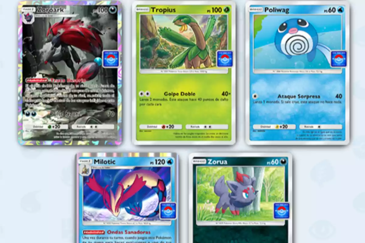 Cinco cartas de Pokémon en español con ilustraciones coloridas y diferentes fondos, incluyendo a Zoroark, Tropius, Poliwag, Milotic y Zorua Cinco cartas de Pokémon en español con ilustraciones coloridas y diferentes fondos, incluyendo a Zoroark, Tropius, Poliwag, Milotic y Zorua