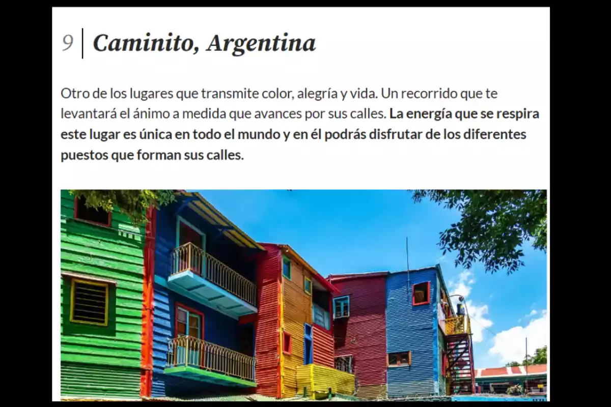 Colorful house facades on a street in Caminito, Buenos Aires, with balconies and a blue sky in the background Colorful house facades on a street in Caminito, Buenos Aires, with balconies and a blue sky in the background