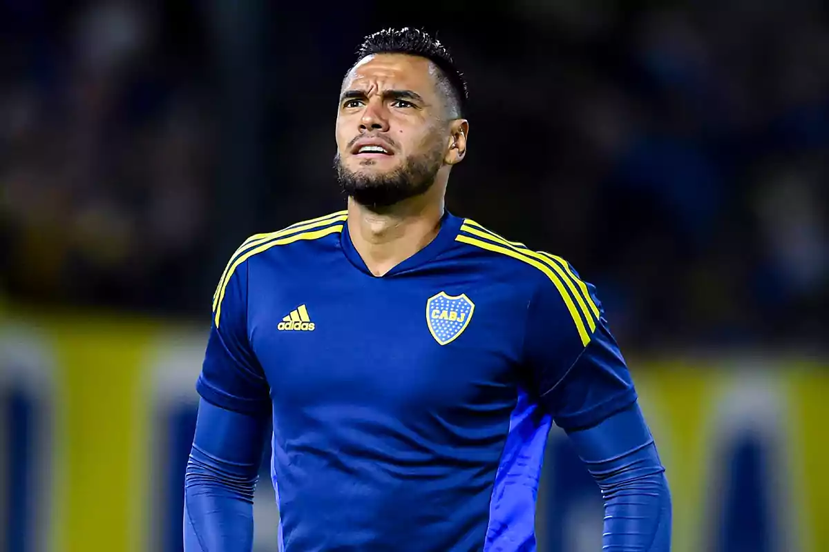 Soccer player wearing a blue Boca Juniors jersey during a match