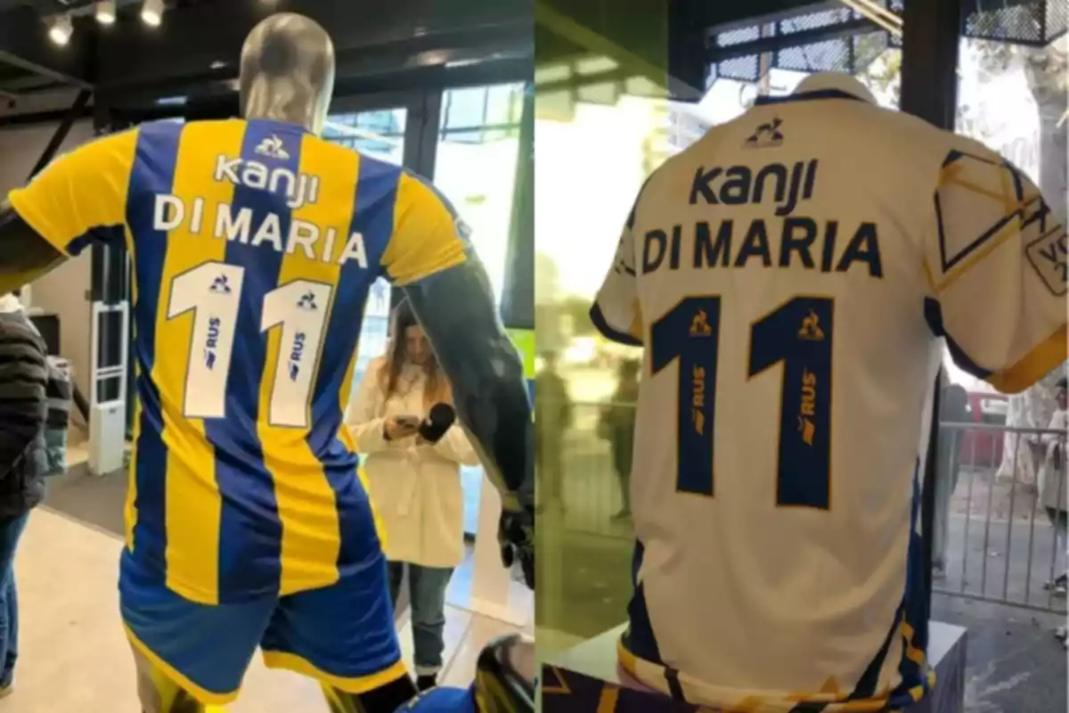 Dos camisetas de fútbol de Rosario Central con el nombre Di María y el número 11 exhibidas en maniquíes, una con franjas amarillas y azules y la otra blanca con detalles en azul y amarillo.