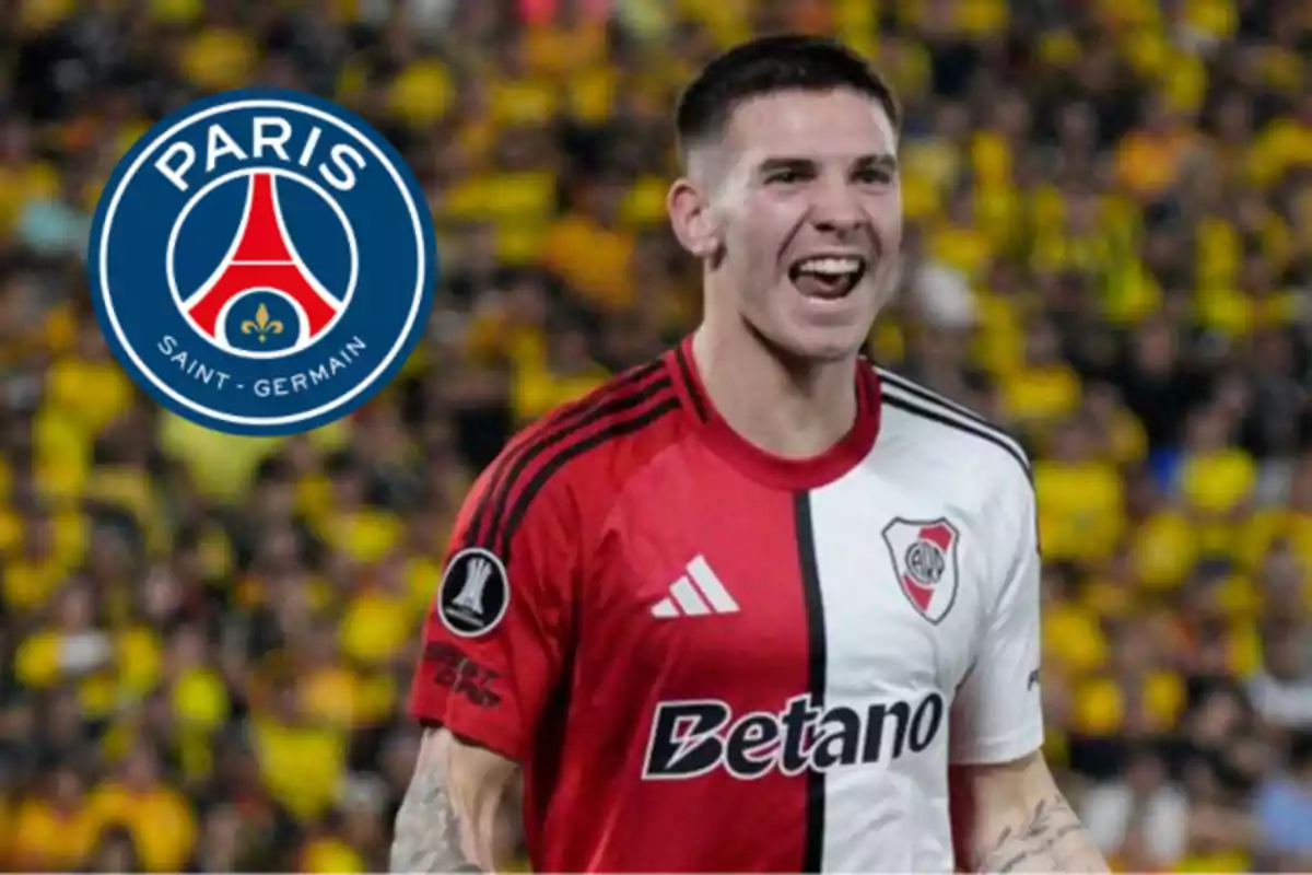 Soccer player wearing a River Plate jersey celebrating with the PSG crest in the background