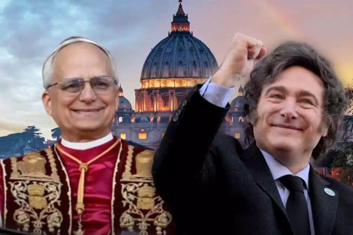 Dos hombres sonrientes, uno con vestimenta religiosa y otro con traje, levantando el puño, con la Basílica de San Pedro de fondo al atardecer.
