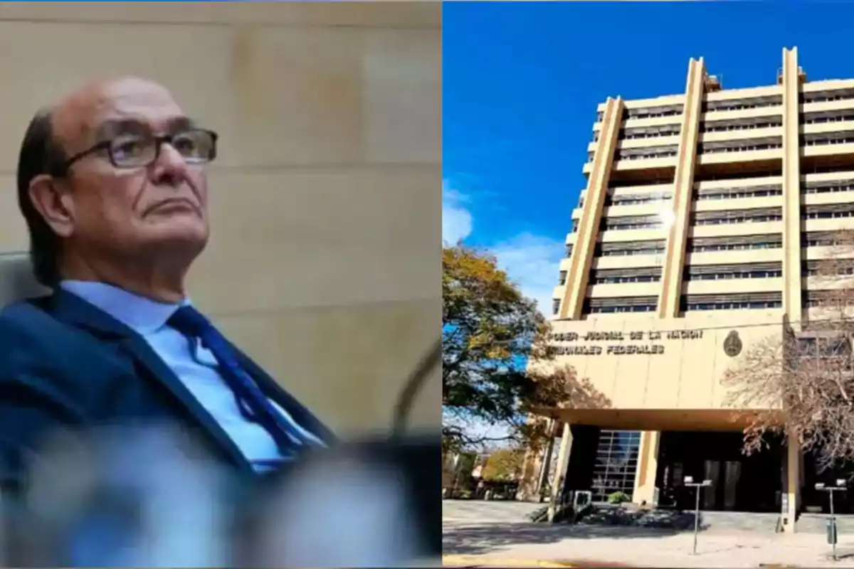 A man in a suit and glasses sitting next to the image of a large government building under a blue sky A man in a suit and glasses sitting next to the image of a large government building under a blue sky