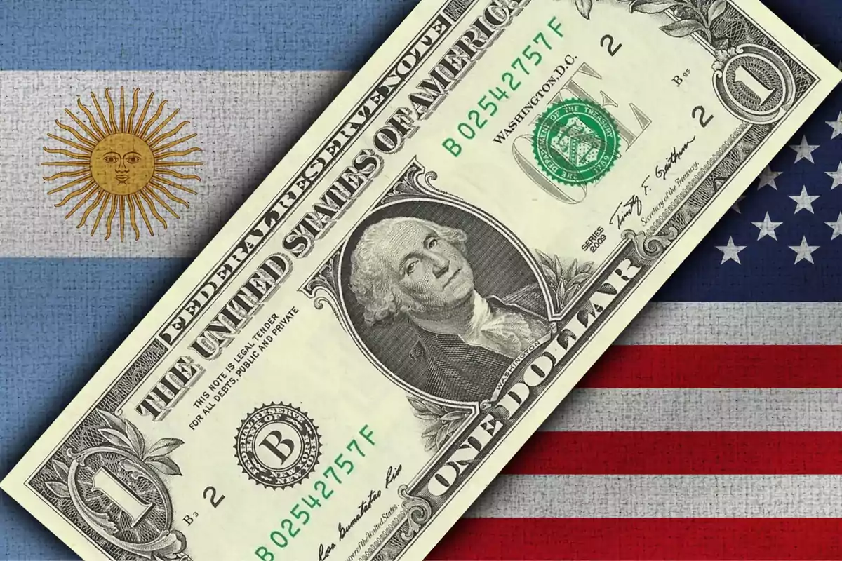 Billete de un dólar estadounidense sobre las banderas de Argentina y Estados Unidos