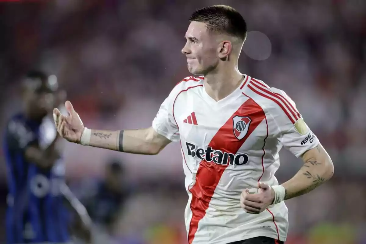 River Plate player celebrating on the field during a match River Plate player celebrating on the field during a match