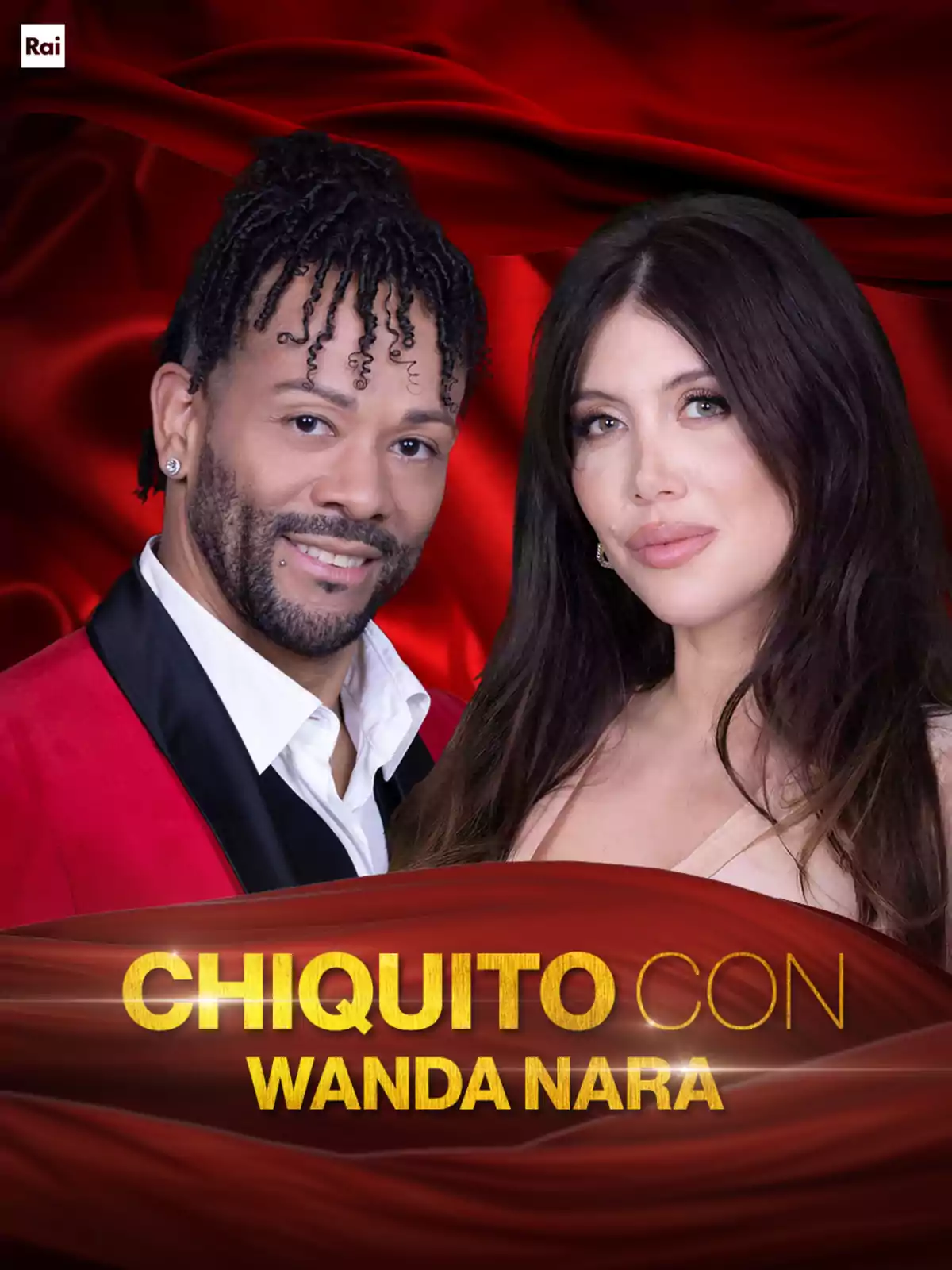 Two people pose in front of a red fabric backdrop with the text Two people pose in front of a red fabric backdrop with the text