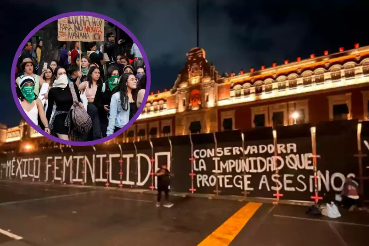 A group of women participates in a feminist demonstration in front of a lit-up building, with protest messages written on a fence.