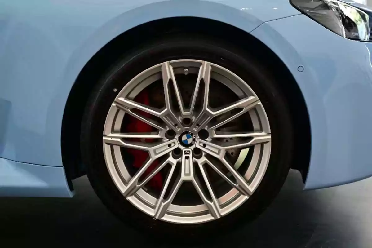 Light blue BMW car alloy wheel Light blue BMW car alloy wheel