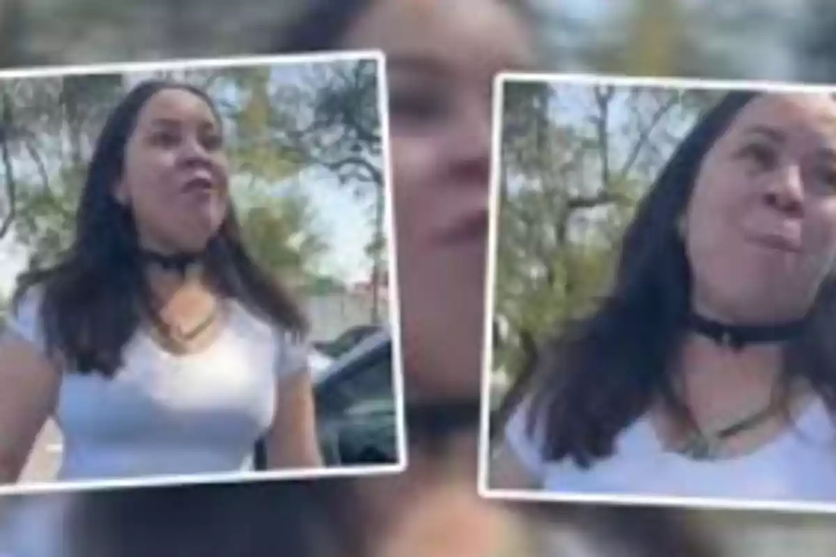 Una mujer con cabello oscuro y una camiseta blanca está al aire libre con árboles de fondo.