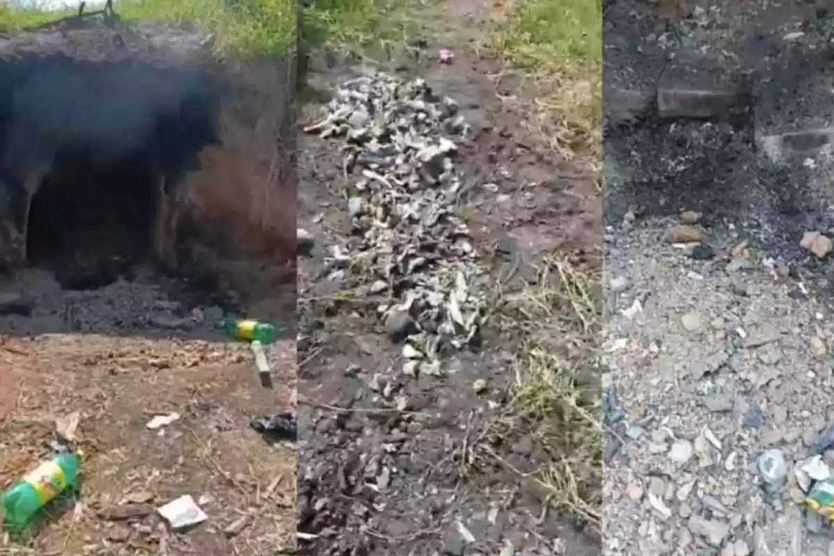 A dark cave with trash and plastic bottles on the ground, a trail of debris, and an area with ashes and rubble.