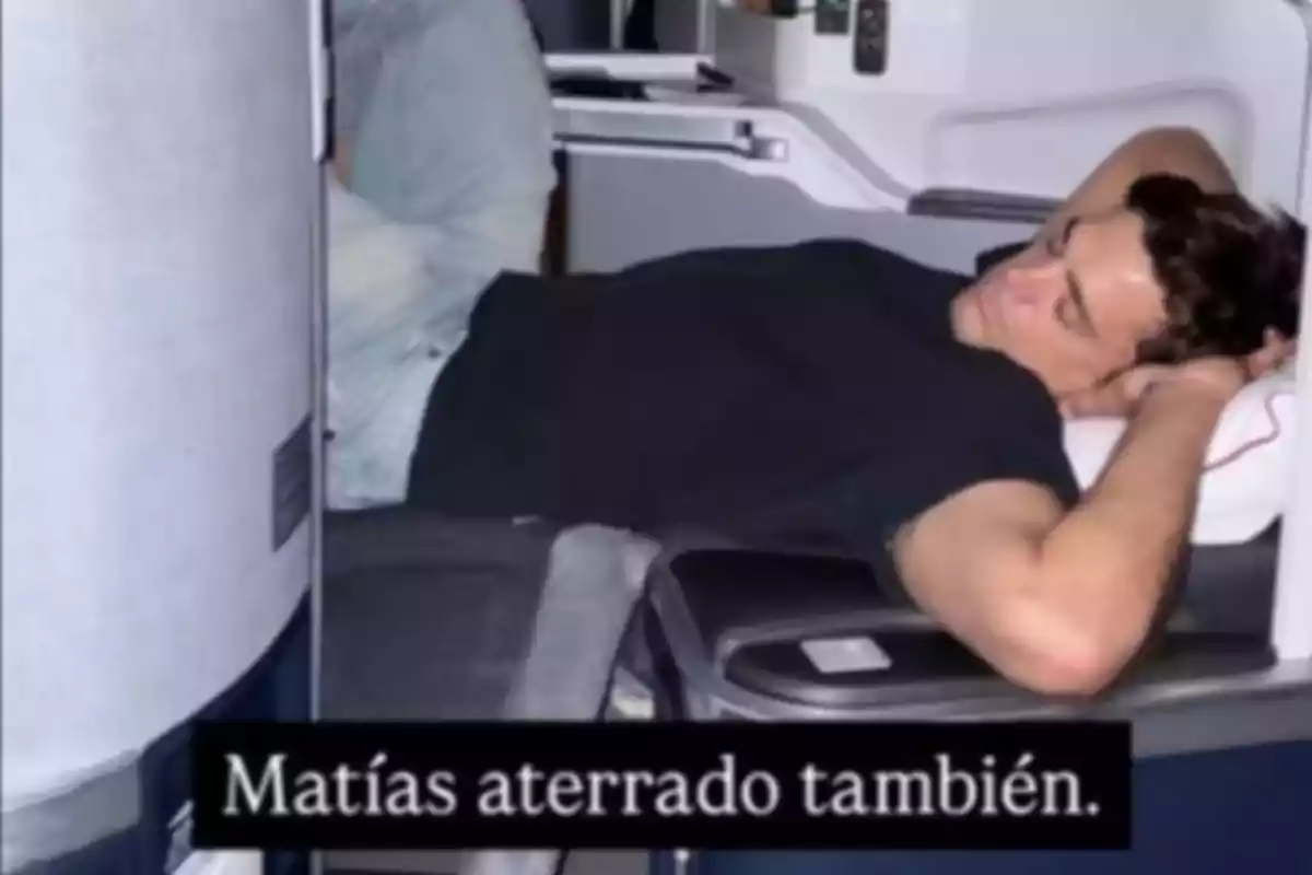 A man resting in an airplane seat with text at the bottom. A man resting in an airplane seat with text at the bottom.