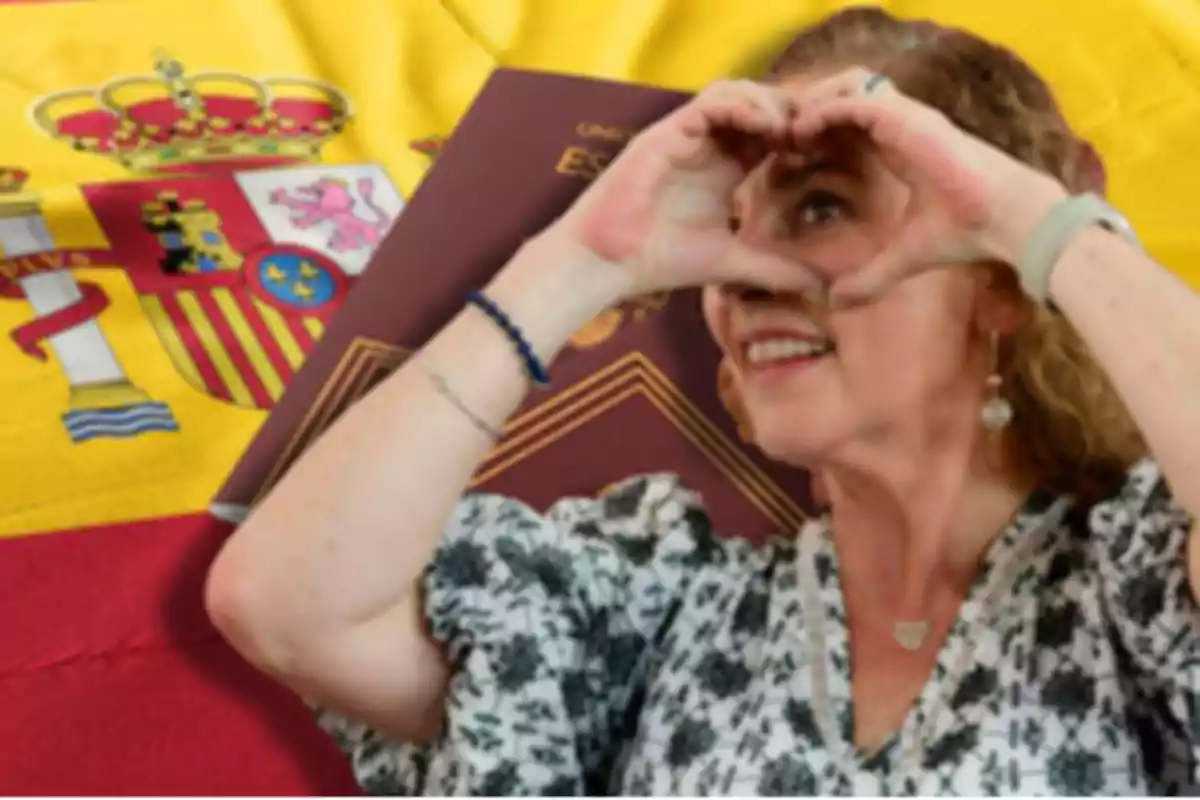 Mujer sonriente haciendo un gesto de corazón con las manos frente a una bandera de España y un pasaporte.