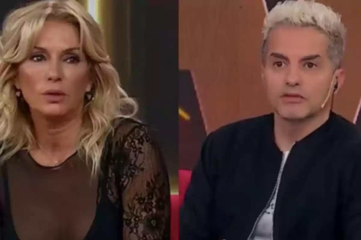 Two people on a television show, a woman with blonde hair and a man with light-colored hair, both with serious expressions.