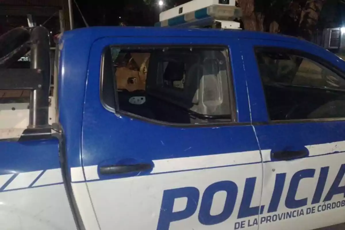 Police patrol car with the rear window broken during the night Police patrol car with the rear window broken during the night
