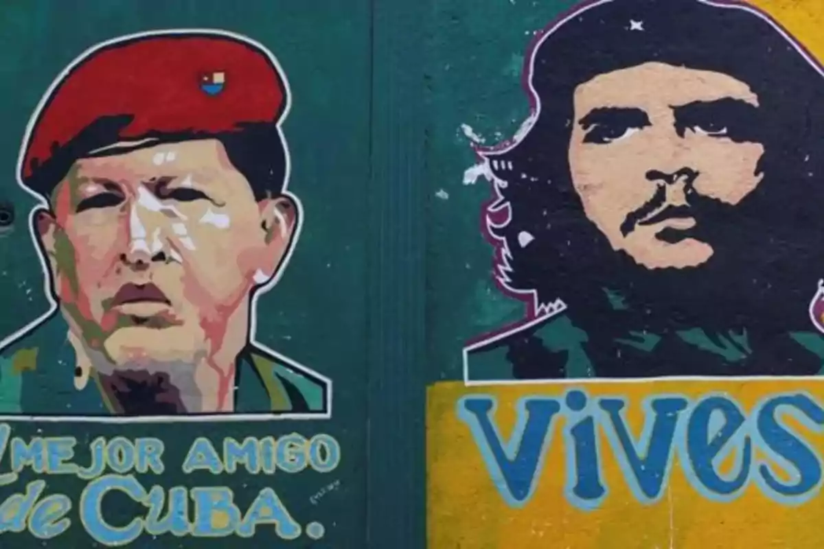 Colorful mural featuring the faces of two historical figures, one wearing a red beret and the other with long hair and a black beret, accompanied by phrases painted at the bottom. Colorful mural featuring the faces of two historical figures, one wearing a red beret and the other with long hair and a black beret, accompanied by phrases painted at the bottom.