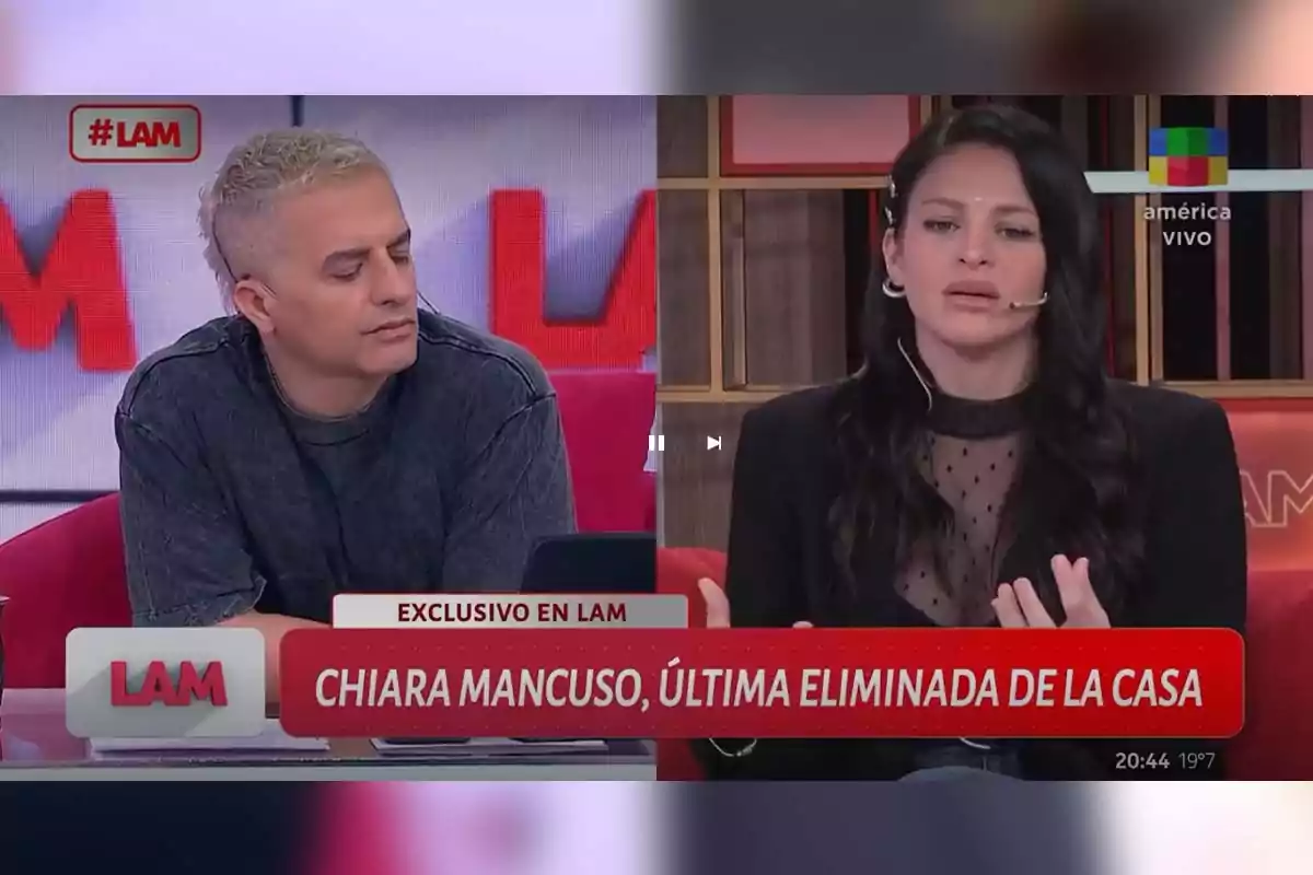 Dos personas están en un programa de televisión llamado LAM, una de ellas es entrevistada y el texto en pantalla indica que es la última eliminada de la casa. Dos personas están en un programa de televisión llamado LAM, una de ellas es entrevistada y el texto en pantalla indica que es la última eliminada de la casa.