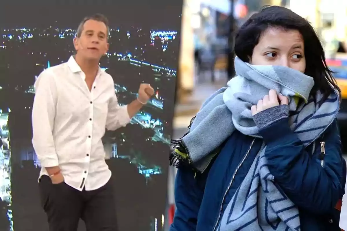 A man in a white jersey speaks in front of a lit-up city while a woman with a scarf and jacket shields herself from the cold on the street.