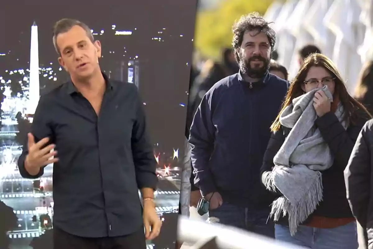 A man standing with a lit urban background and next to him a couple walking bundled up, the woman covering her face with a scarf.
