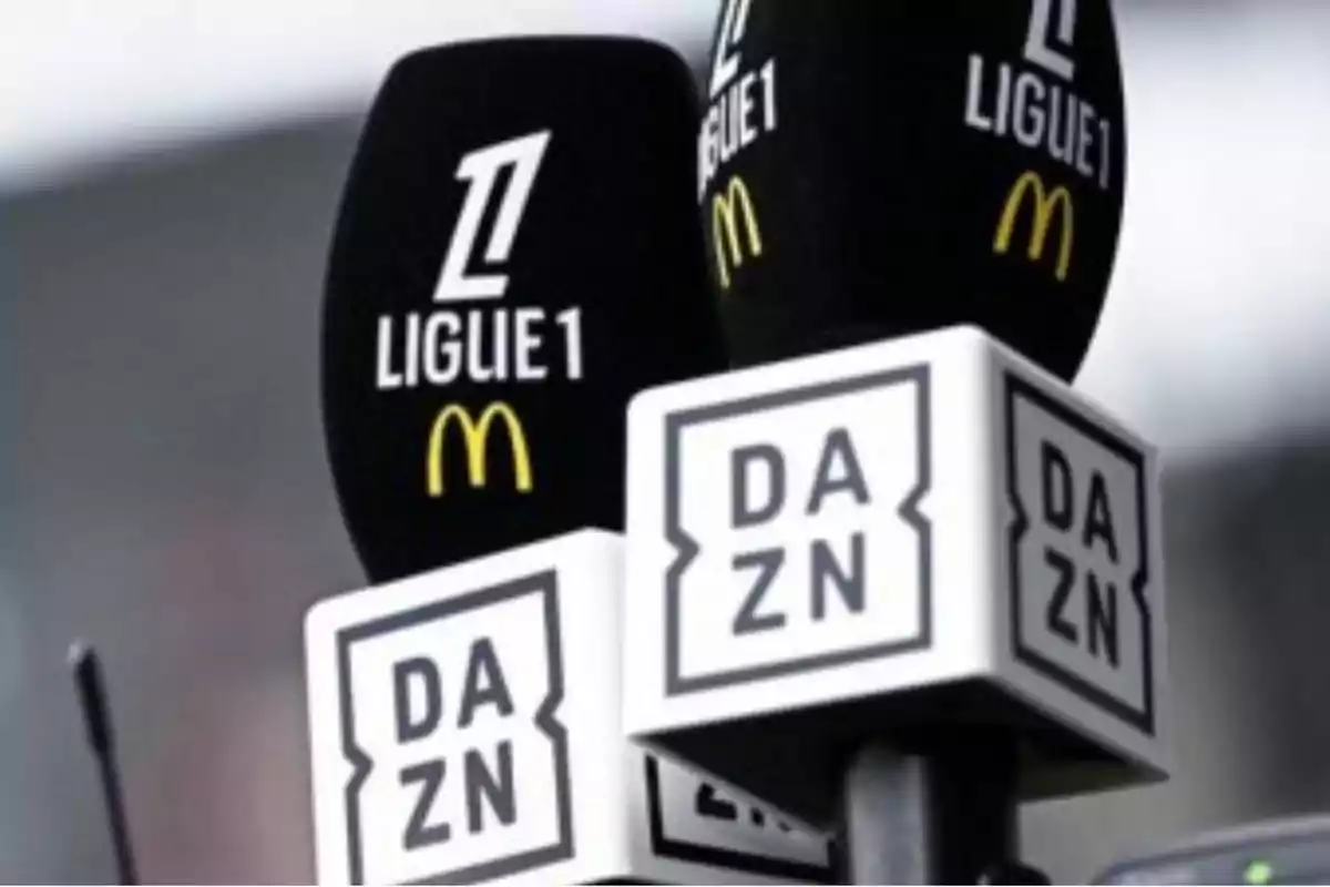 Microphones with Ligue 1 and DAZN logos. Microphones with Ligue 1 and DAZN logos.
