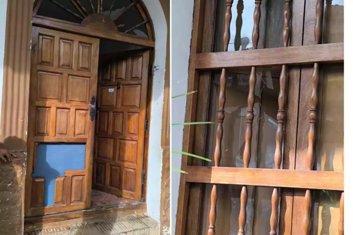 A wooden door with a classic design is open, revealing a partially visible interior, next to a window with wooden bars and a broken glass. A wooden door with a classic design is open, revealing a partially visible interior, next to a window with wooden bars and a broken glass.