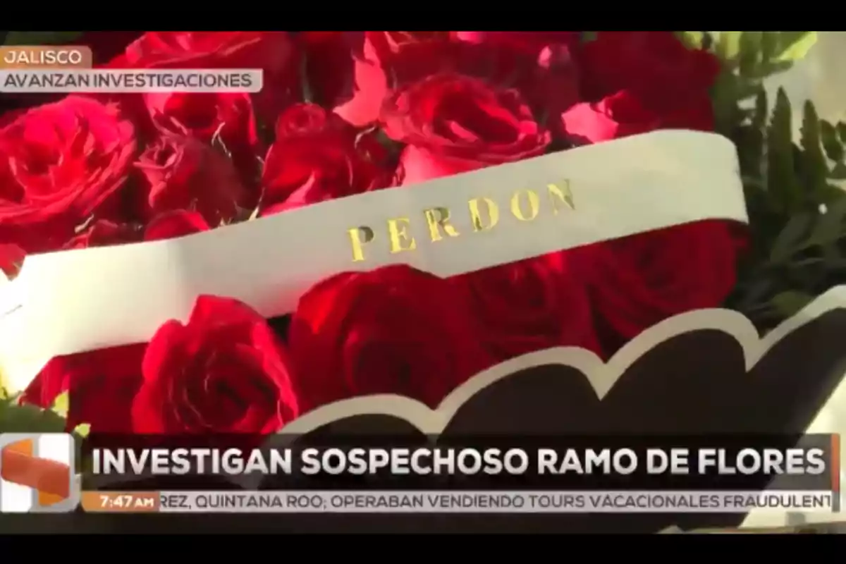 A bouquet of red roses with a ribbon that says A bouquet of red roses with a ribbon that says