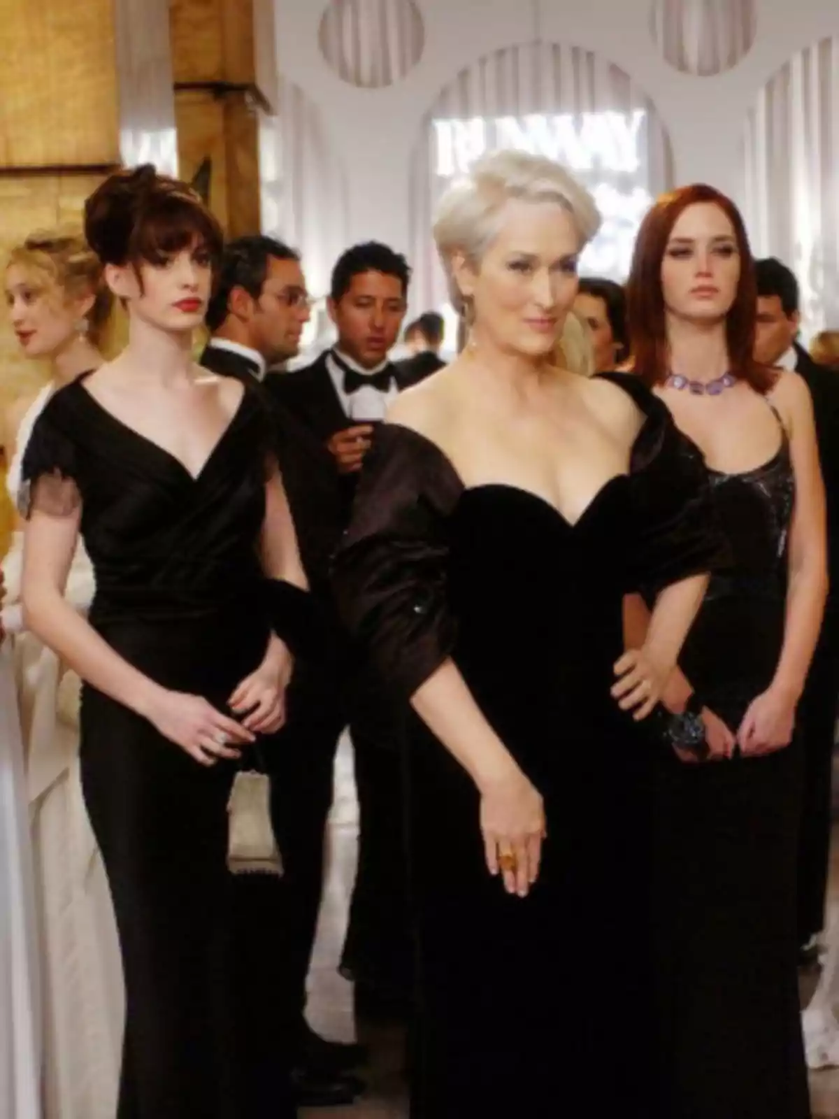Elegantly dressed people at a formal event. Elegantly dressed people at a formal event.
