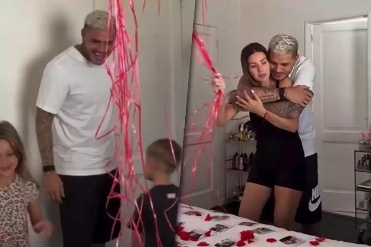 Mauro Icardi y la China Suárez se abrazan en una habitación decorada con cintas rojas y pétalos, mientras dos niños juegan cerca.