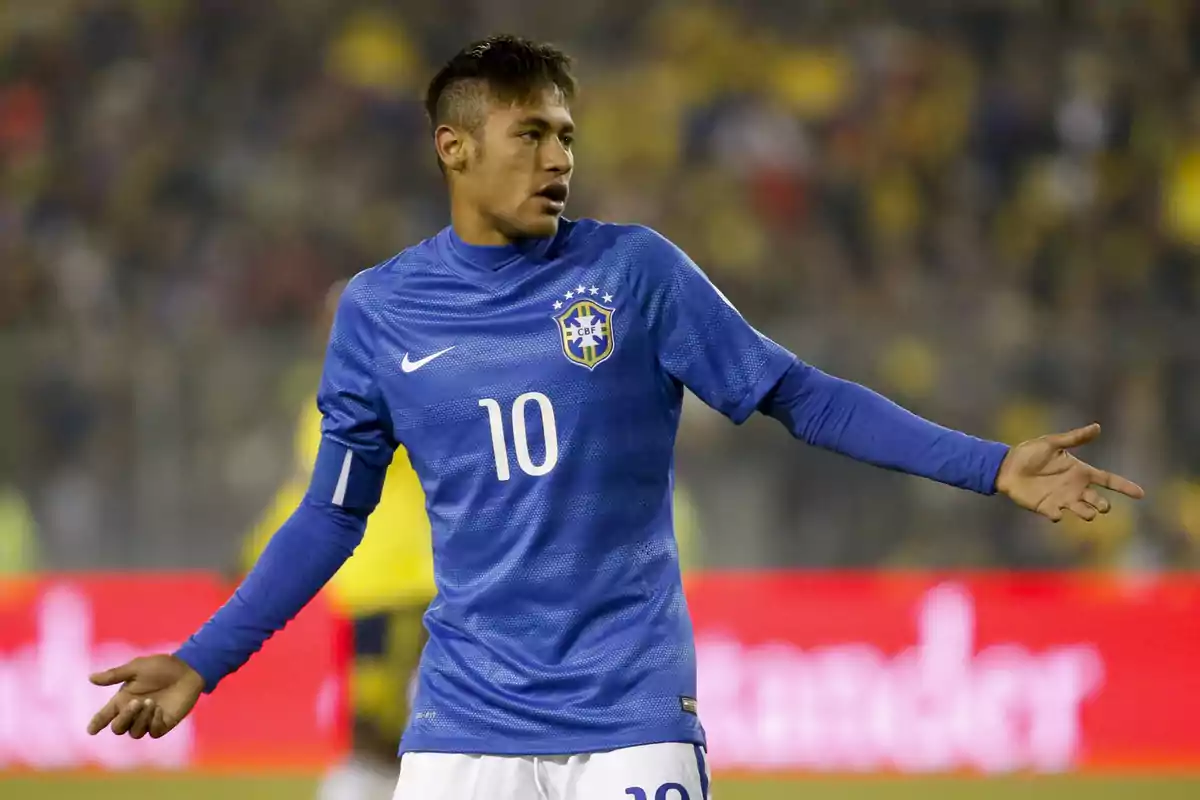 Soccer player wearing Brazil’s blue uniform with the number 10 on the chest extends his arms in a stadium during a match Soccer player wearing Brazil’s blue uniform with the number 10 on the chest extends his arms in a stadium during a match