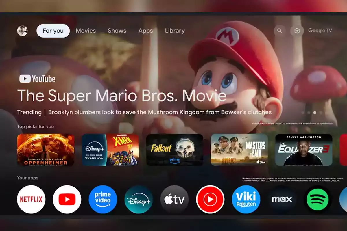 Google TV home screen displaying movie and series recommendations, with The Super Mario Bros. Movie highlighted and several streaming apps visible at the bottom. Google TV home screen displaying movie and series recommendations, with The Super Mario Bros. Movie highlighted and several streaming apps visible at the bottom.