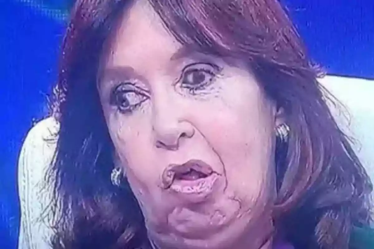 Brown-haired woman with a distorted facial expression and a blue background