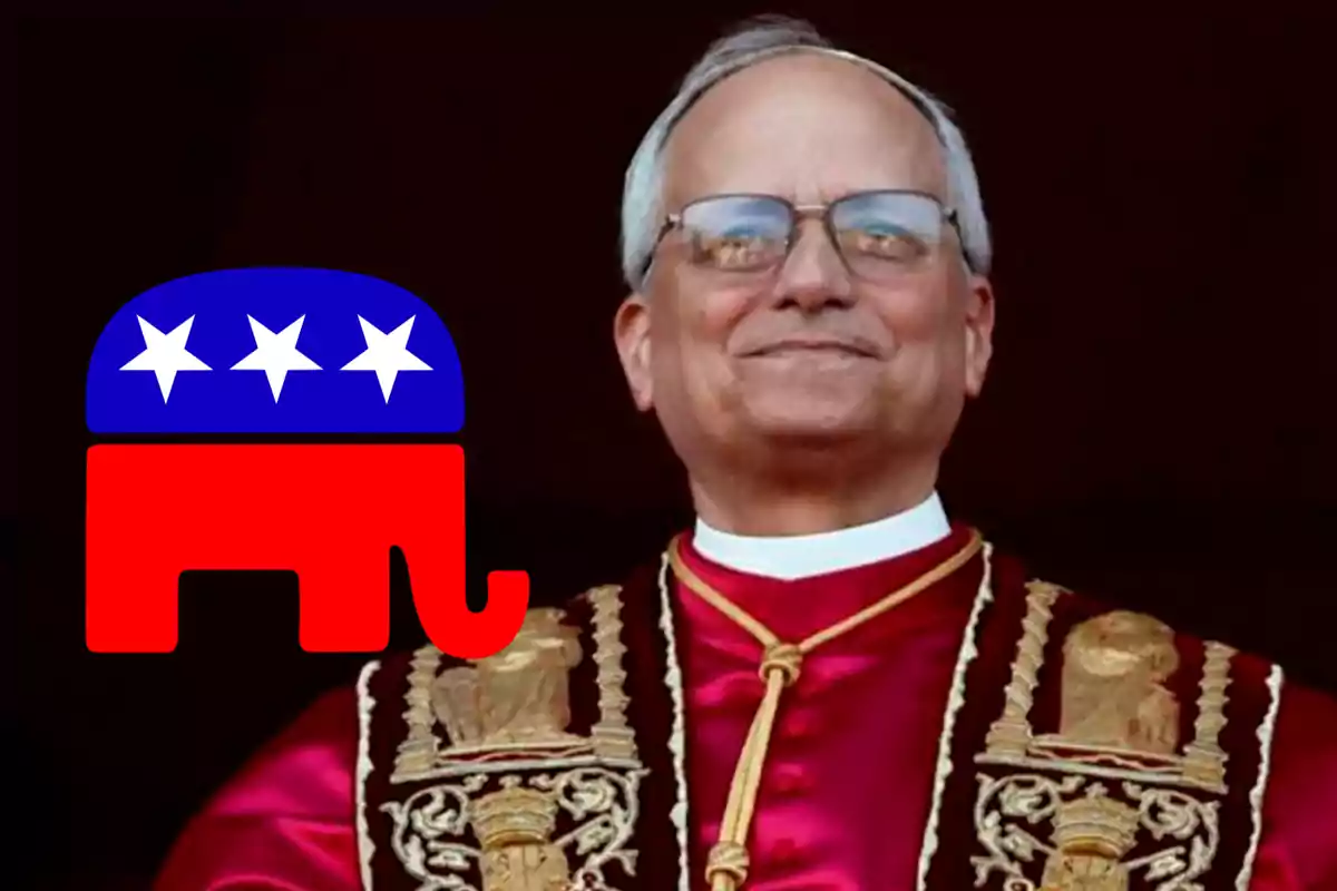 Un hombre mayor con gafas y vestimenta ceremonial roja y dorada, junto a un símbolo de elefante rojo con estrellas blancas sobre un fondo azul.