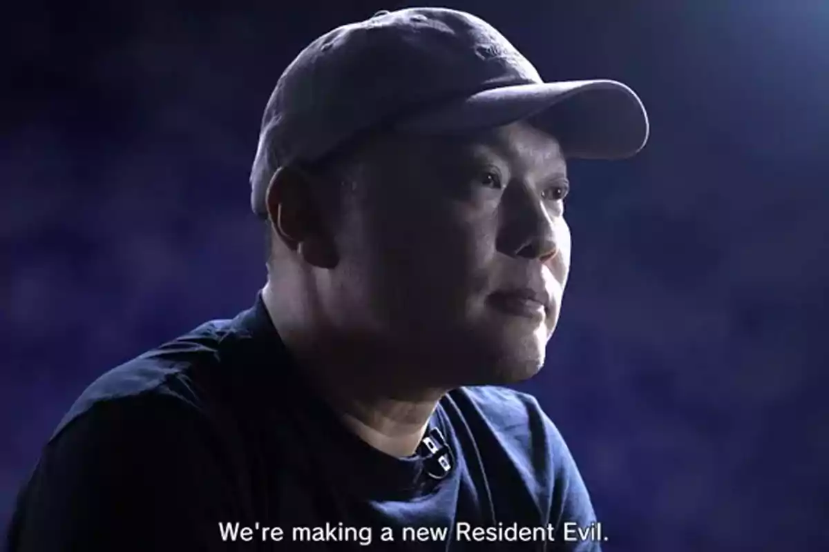 Man wearing a cap looking to the right with a dark background and a subtitle that says Man wearing a cap looking to the right with a dark background and a subtitle that says