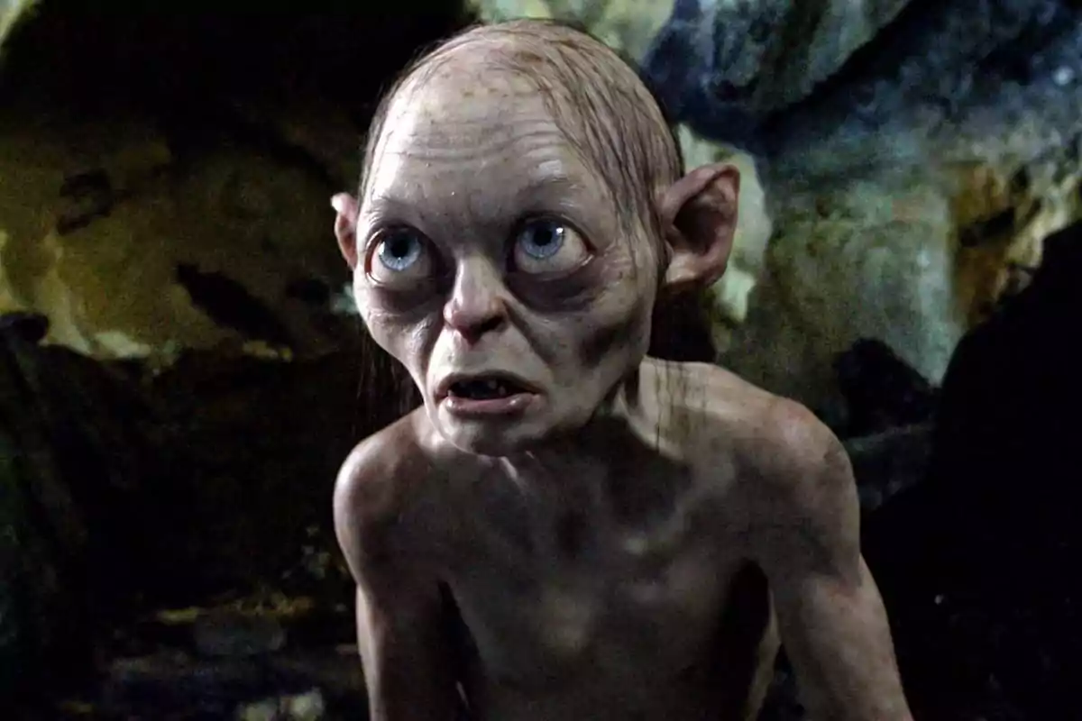 Thin-looking creature with large eyes in a dark cave Thin-looking creature with large eyes in a dark cave
