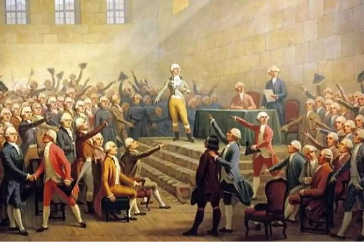 Pintura que muestra a un grupo numeroso de hombres con pelucas blancas y ropa del siglo XVIII reunidos en una sala, muchos de ellos levantando el brazo y señalando hacia una persona de pie en el centro sobre una plataforma