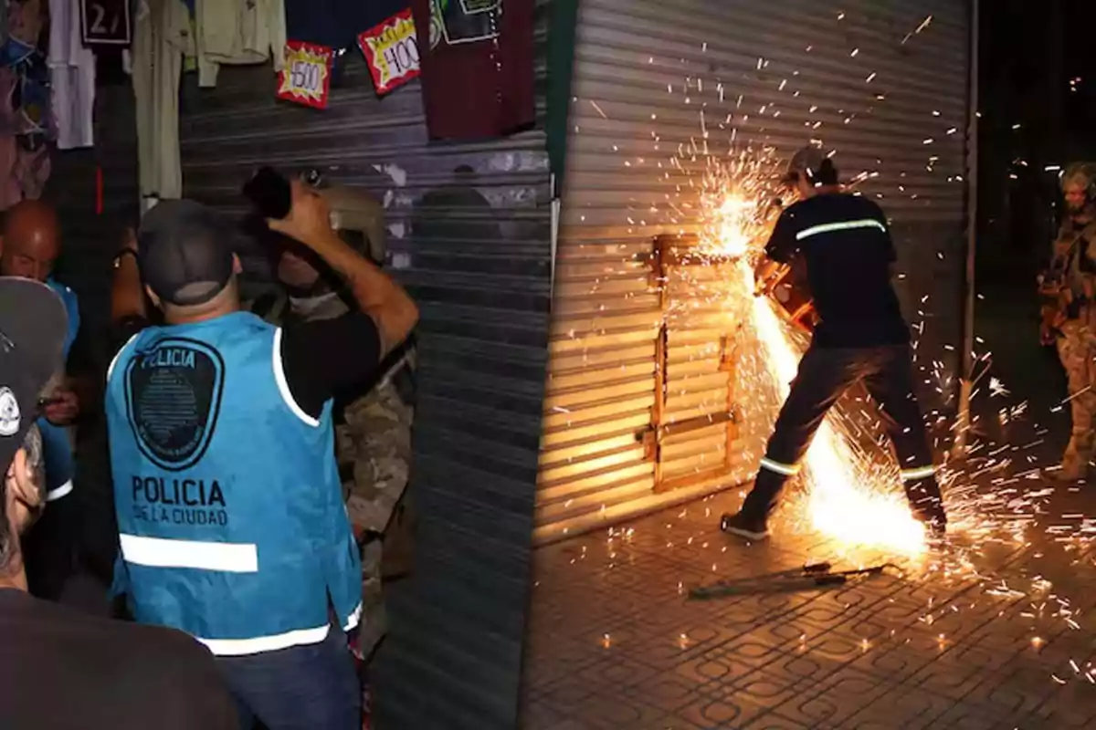 Policías inspeccionan un local mientras un trabajador corta una persiana metálica con una herramienta eléctrica, generando chispas.