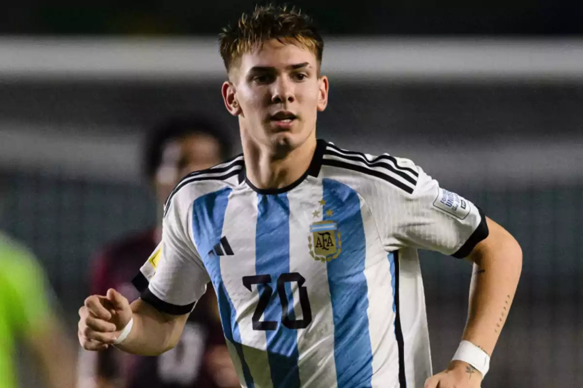 Soccer player wearing the Argentina national team jersey number 20 during a match Soccer player wearing the Argentina national team jersey number 20 during a match