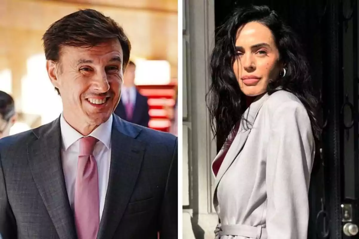 A man in a suit and pink tie smiles while a woman with dark, loose hair poses in a light coat under the sunlight.