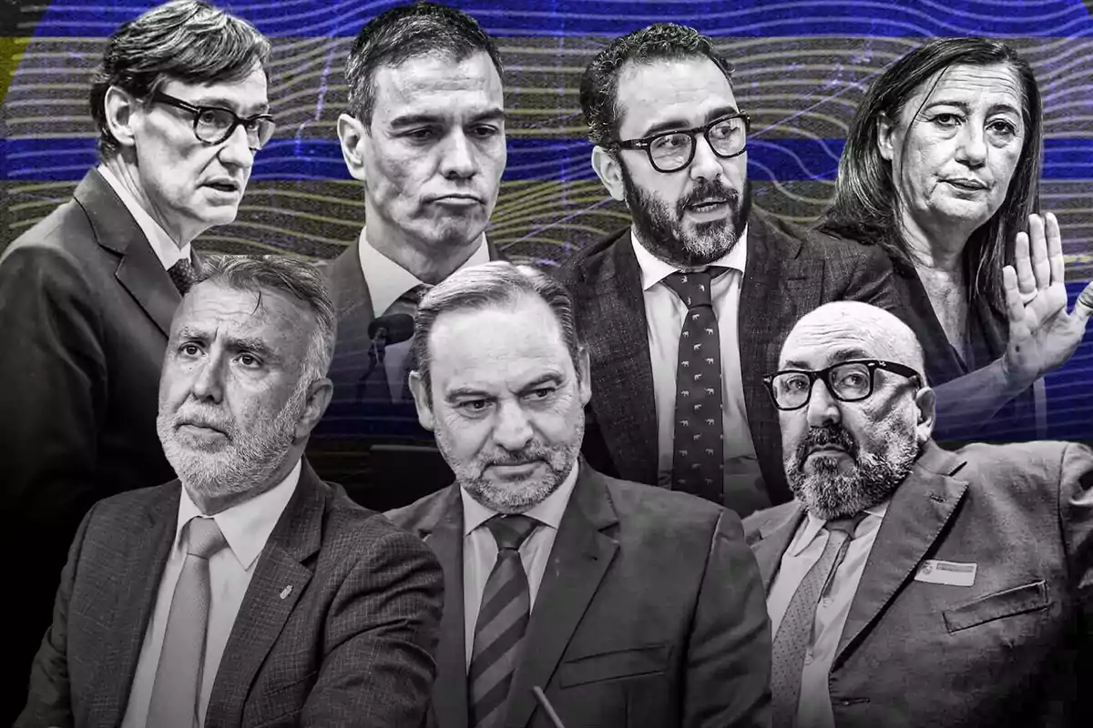 Un grupo de personas en trajes formales posando frente a un fondo abstracto con líneas azules y negras.