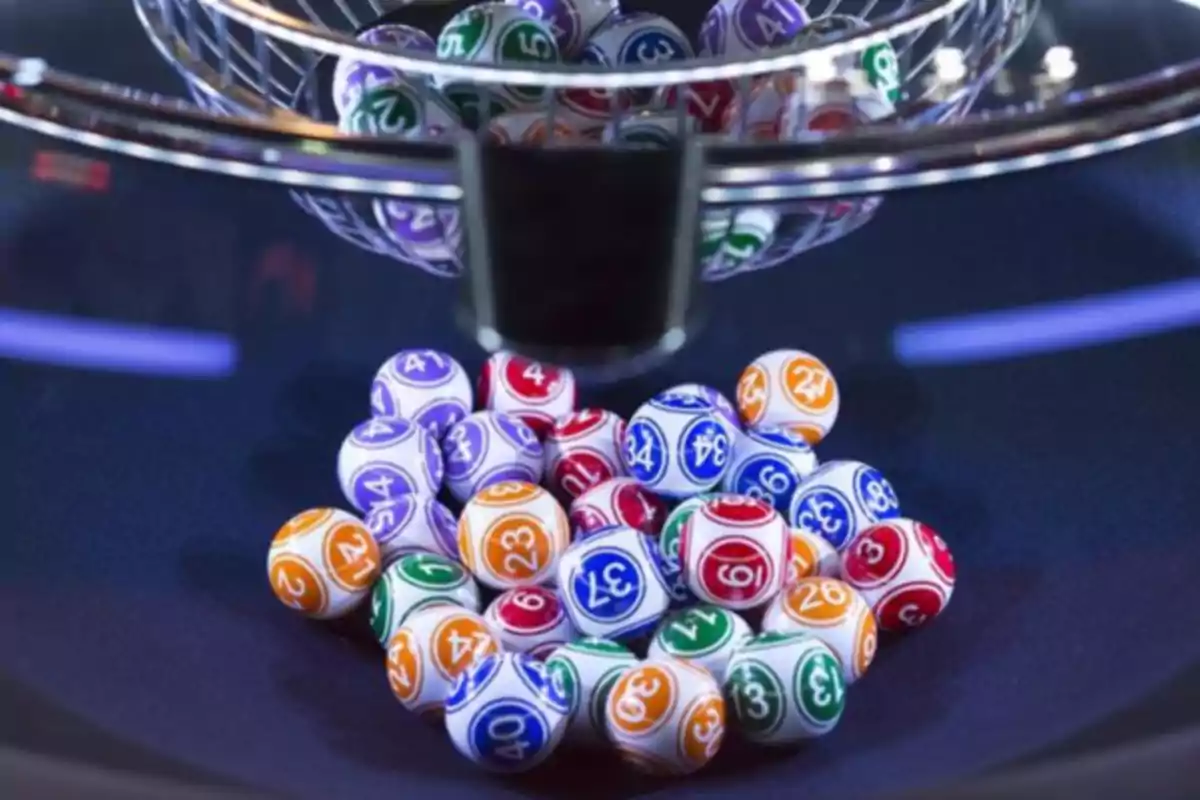 Colored lottery balls in a drawing machine.